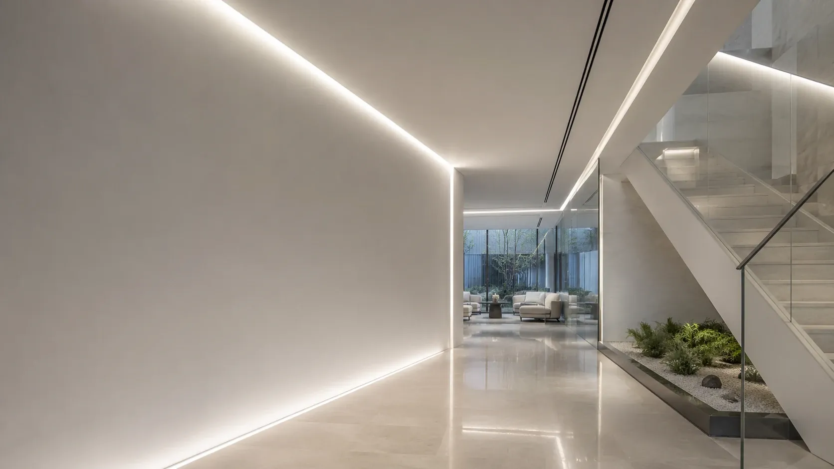 Architectural interior illuminated by integrated linear LED lighting